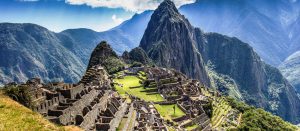 View of Machu Picchu from an upper terrace with Huayna Picchu mountain in the background